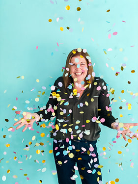Susanna Reay celebrating her coaching clients success with confetti